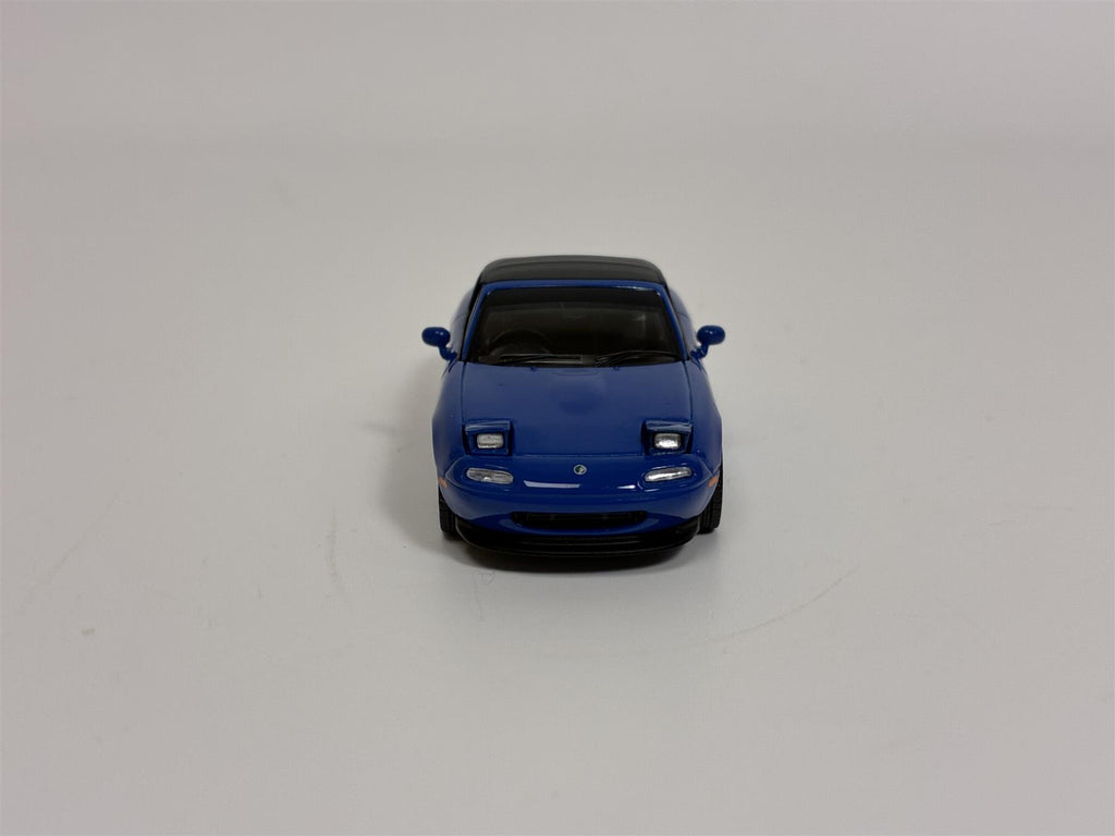 thumbnail interactive-video image 1 of Mini GT 1/64 Mazda Miata MX-5 (NA) Tuned Version – Dark Blue #1069, Diecast Model 1 of 2