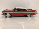 a red and white toy car