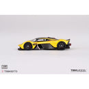 a yellow toy car on a white background