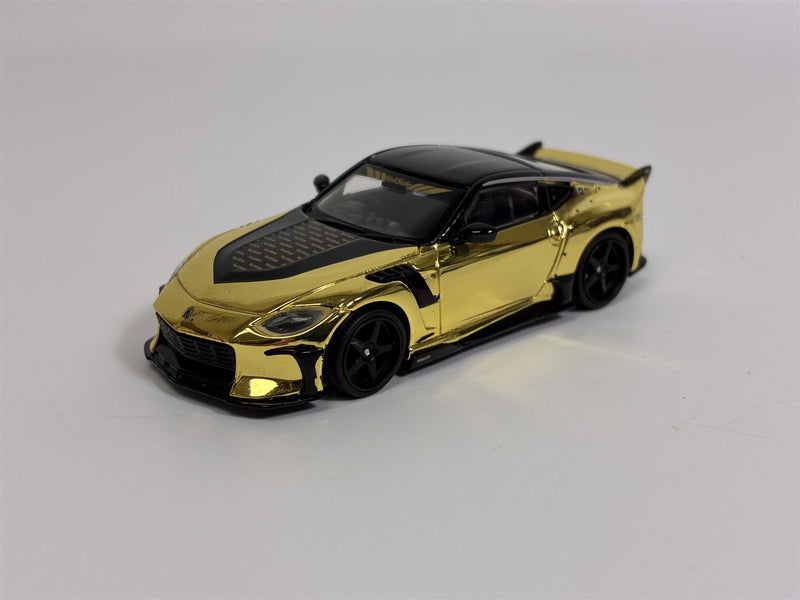 Nissan Z VeilSide FFZ400 Gold Chrome RHD 1:64 Scale Mini GT MGT00985R