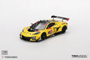 a yellow race car with black and white graphics