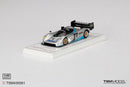 a silver race car on a white surface