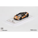 a toy car on a white surface