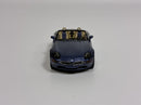 a blue toy car with a convertible top