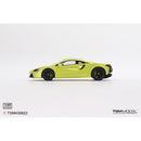 a green sports car on a white background