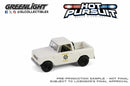 a white toy truck with a police logo