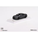 a toy car on a white surface
