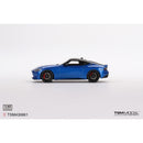 a blue toy car on a white background