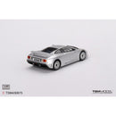 a silver toy car on a white background