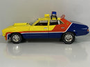 a toy car with a light on top