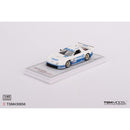 a toy car on a white surface