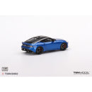 a blue toy car on a white background