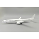 a model airplane on a grey background