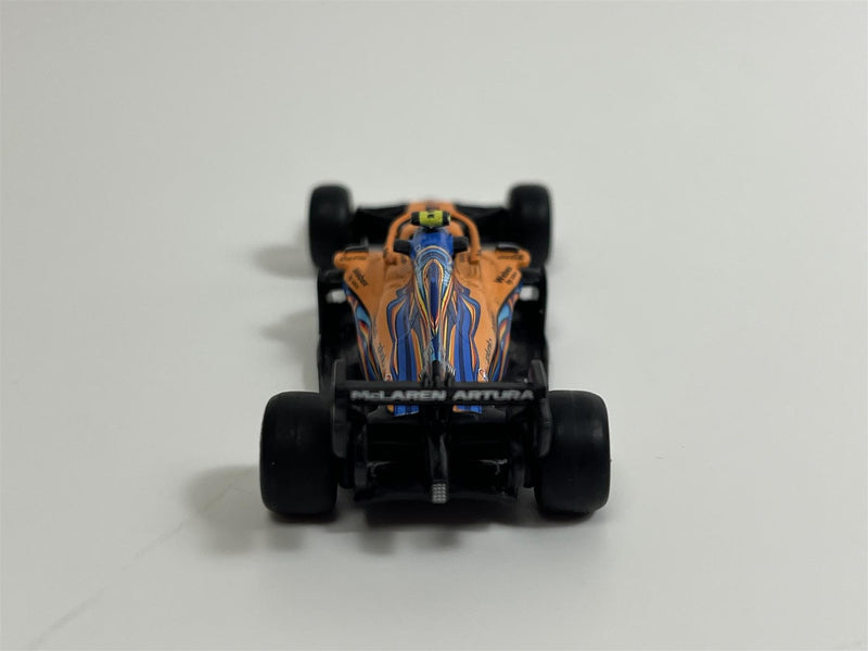 Lando Norris McLaren Abu Dhabi GP 2021 1:64 Tarmac Works IXO T64GF040LN3