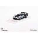 a toy car on a white surface