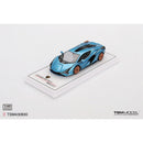 a blue toy car on a white surface