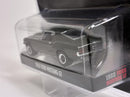 a black car in a plastic box