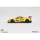 a yellow race car with black numbers