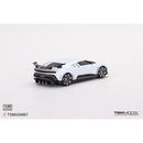 a white toy car with black trim