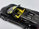 a black and yellow toy car