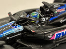 a toy car with a person in the driver's seat