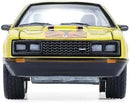 the back of a yellow car