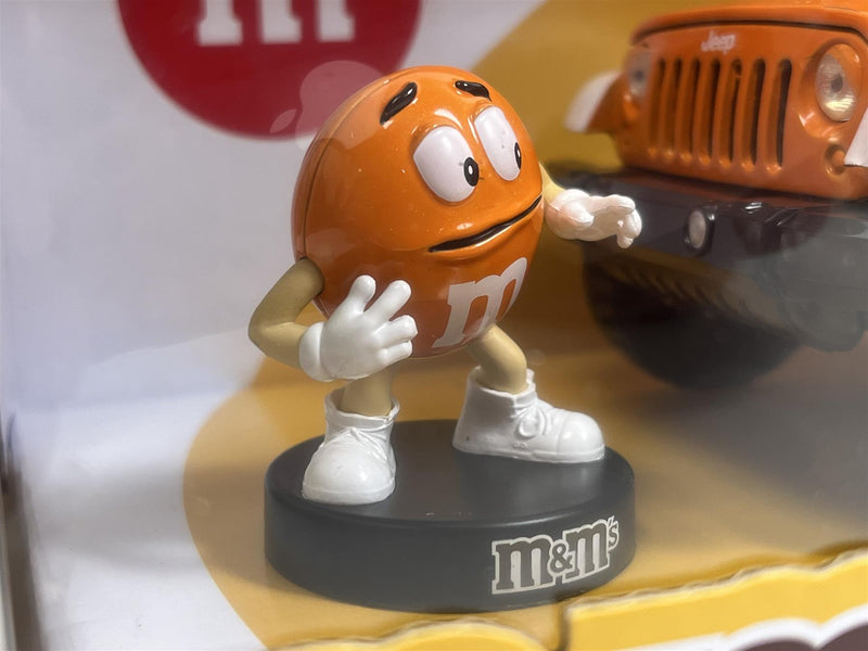 M&Ms Orange Figure and 2007 Jeep Wrangler 1:24 Scale Jada 253255068 34401