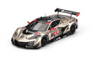 a gold and black toy race car