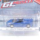 a blue car in a plastic package