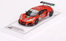 a red race car on a white surface