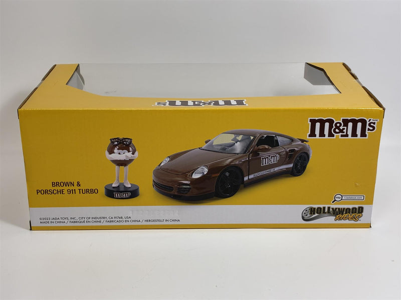 M&Ms Brown Figure and Porsche 911 Turbo 1:24 Scale Jada 34624