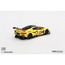 a yellow race car with black and red graphics