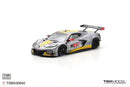 a silver and yellow race car