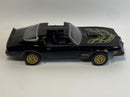 a black toy car with wings