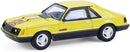 a yellow toy car with black stripes