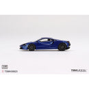 a blue sports car on a white background