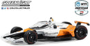 a white and orange toy car