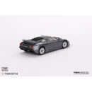 a grey toy car on a white background