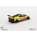 a yellow race car with black and red graphics
