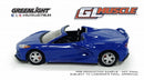 a blue toy car with a convertible top