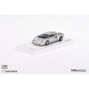 a toy car on a white surface