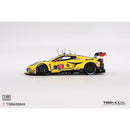 a yellow race car with black and red decals