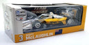 a yellow and white toy car in a box
