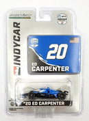a blue toy car in a package