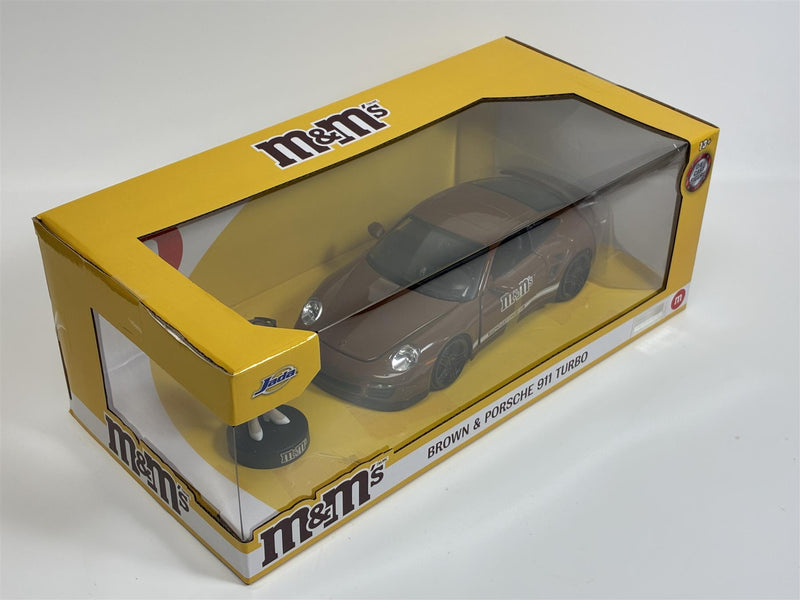 M&Ms Brown Figure and Porsche 911 Turbo 1:24 Scale Jada 34624