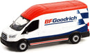 a toy van with a red white and blue stripe