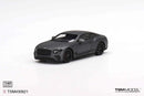a black toy car on a white background