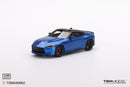 a blue toy car on a white background