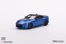 a blue toy car on a white background