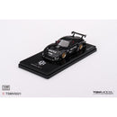 a black toy car on a black surface
